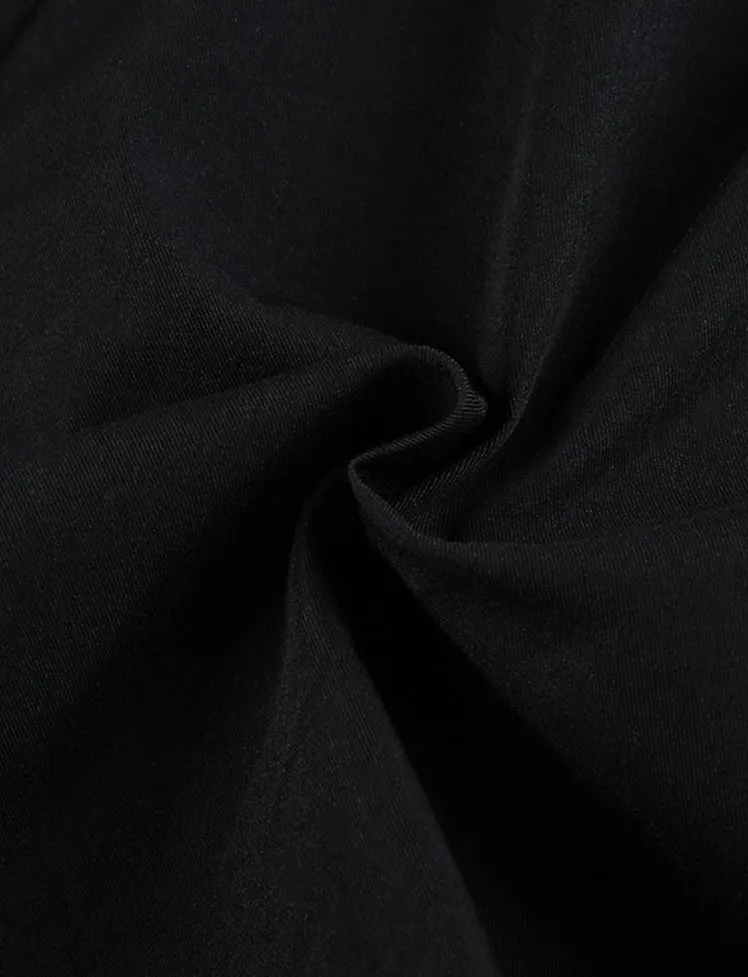 Irregular pleated skirt with black leg loops