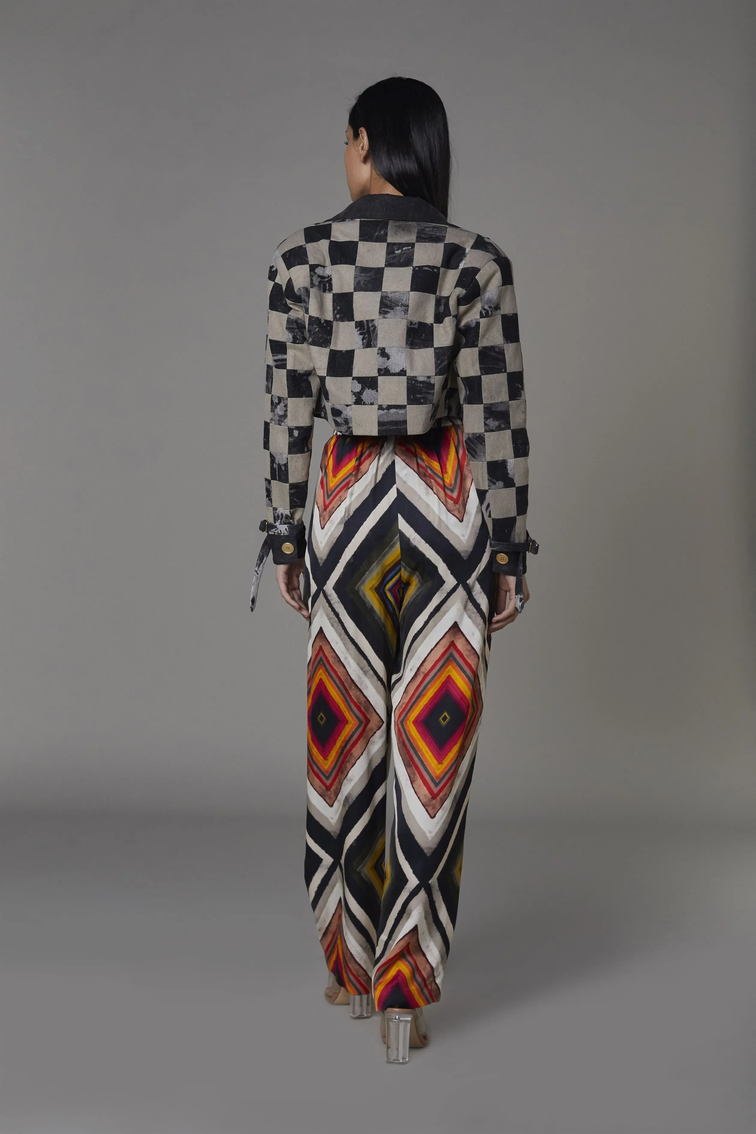 Saaksha & KinniÂ    I   Marble checked crop jacket  Black denim bustier  Black diamond trousers Jacket - Drill  Bustier - Drill  Trousers - Satin Jacket - Grey / Black / Stone  Bustier - Grey  Trousers - Multi   SS22005    SS22006    SS22007